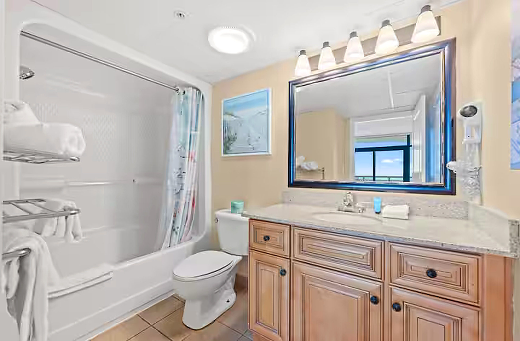 Full bathroom with tub, shower and vanity