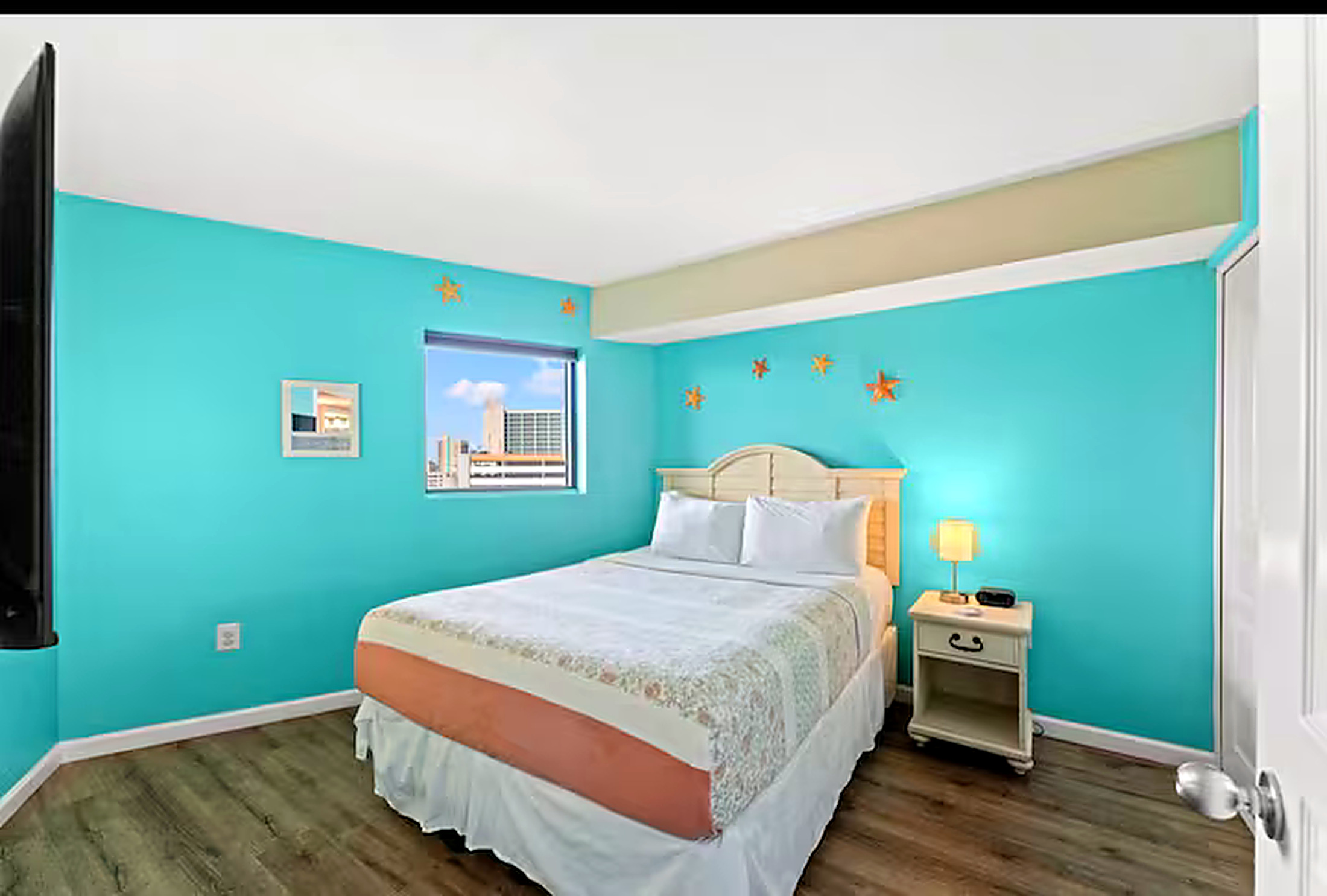 Oceanfront bedroom with balcony access